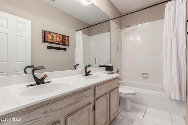 full bathroom featuring tile patterned flooring, vanity, shower / bath combination with curtain, and toilet