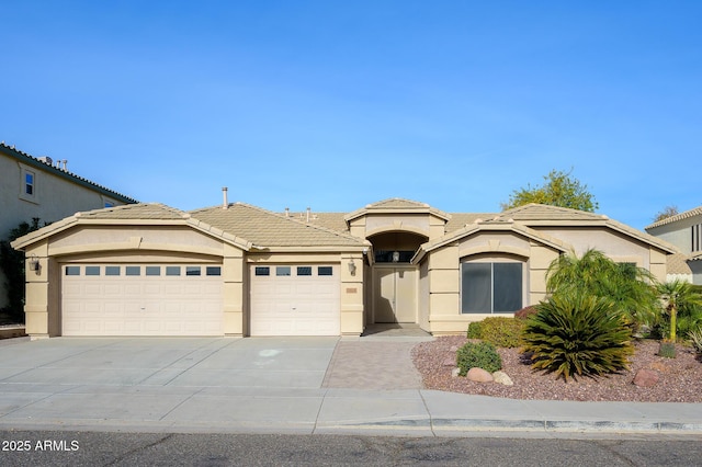 view of front of property featuring a garage