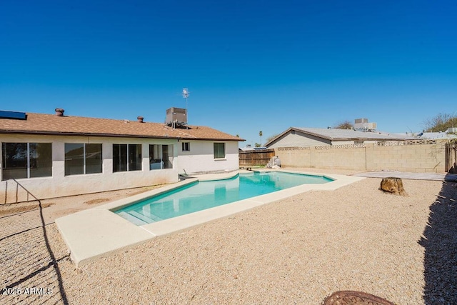 view of pool with a fenced in pool, a fenced backyard, and a patio area