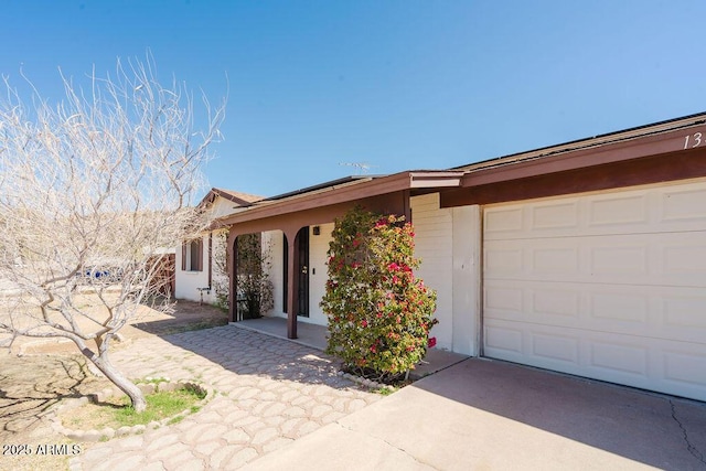 single story home with a garage