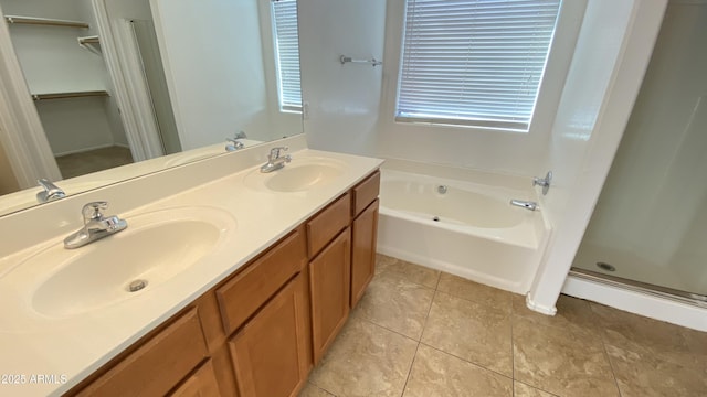 7425 W Crown King Rd, Phoenix, AZ 85043 - bathroom with a garden tub, a sink, double vanity, and a stall shower