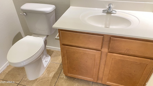 7425 W Crown King Rd, Phoenix, AZ 85043 - bathroom featuring toilet, a textured wall, vanity, and baseboards
