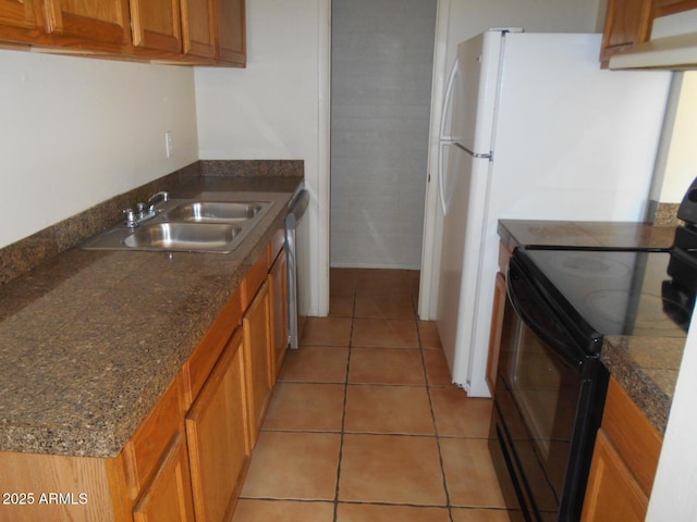 kitchen featuring brown cabinets, a sink, black range with electric cooktop, light tile patterned floors, and dishwasher