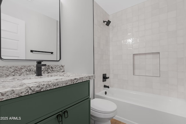 3607 N 79th Ave, Phoenix, AZ 85033 - full bathroom with toilet,  shower combination, vanity, and wood finished floors