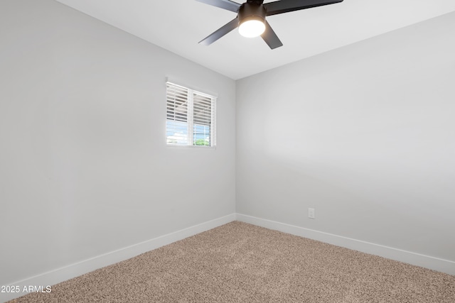 3607 N 79th Ave, Phoenix, AZ 85033 - empty room featuring light colored carpet, baseboards, and ceiling fan