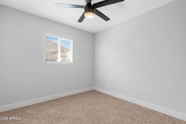 3607 N 79th Ave, Phoenix, AZ 85033 - empty room with light carpet, baseboards, and a ceiling fan