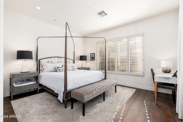 bedroom featuring dark hardwood / wood-style floors