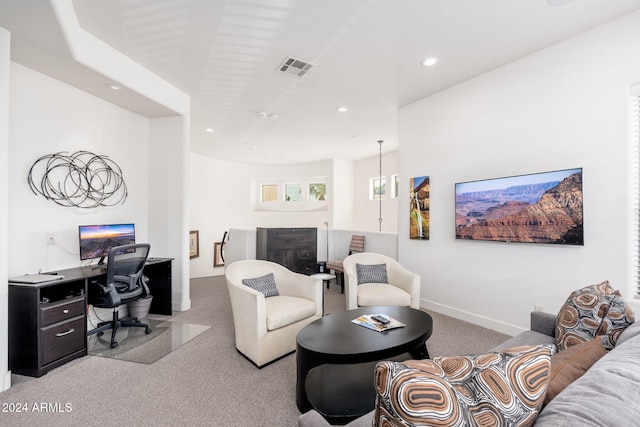 living room with light colored carpet