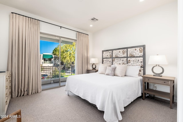 bedroom featuring carpet, access to exterior, and multiple windows