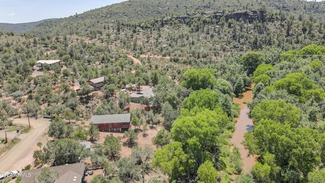 aerial view with a forest view and a mountain view