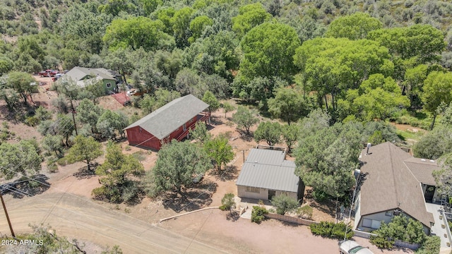 aerial view featuring a view of trees