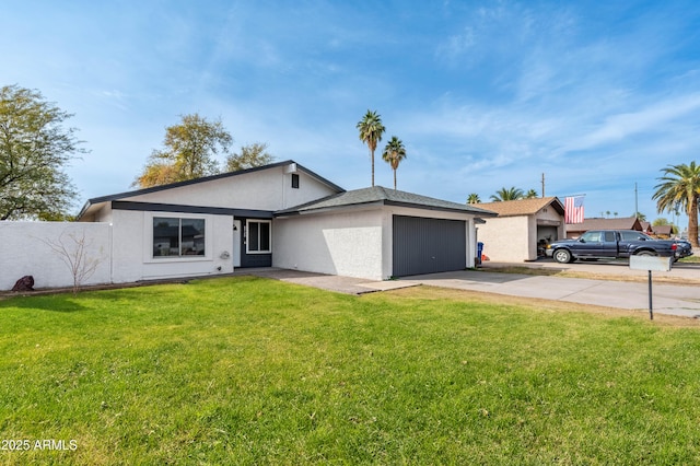 single story home with a garage and a front yard