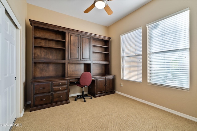 office featuring light colored carpet and ceiling fan