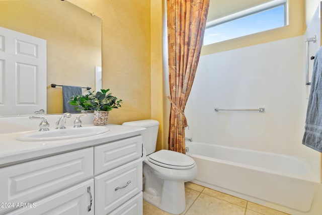 full bathroom featuring vanity, toilet, tile patterned floors, and shower / bath combo