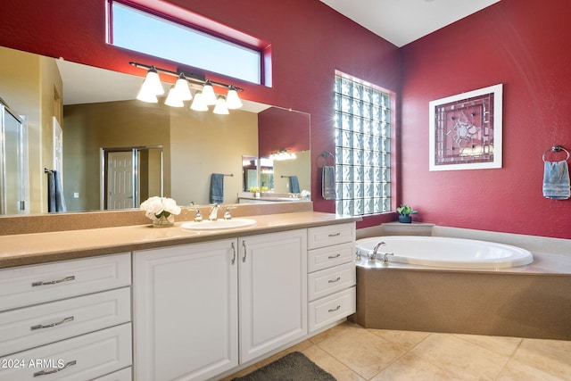 bathroom with vanity, plus walk in shower, and tile patterned floors