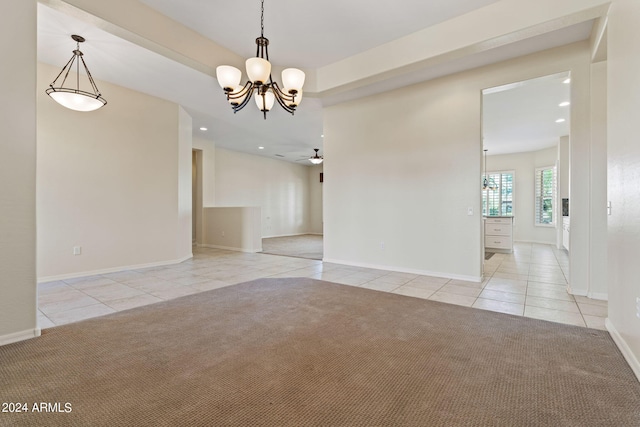 spare room featuring light carpet, recessed lighting, light tile patterned flooring, and baseboards