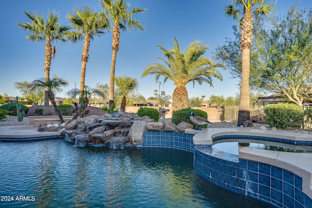 pool with a jacuzzi