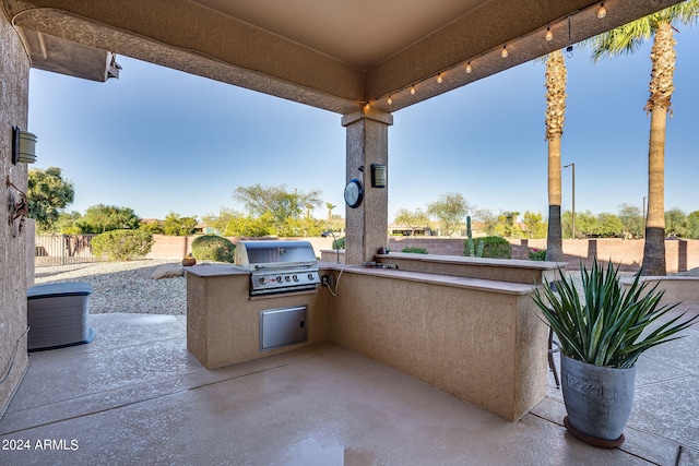 view of patio / terrace with exterior kitchen and grilling area