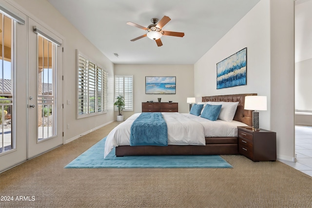 bedroom with carpet floors, access to exterior, ceiling fan, and baseboards