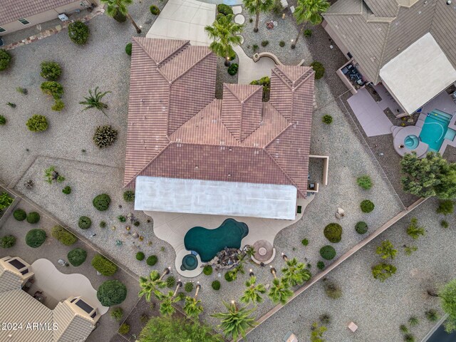 view of pool with a patio area and an in ground hot tub