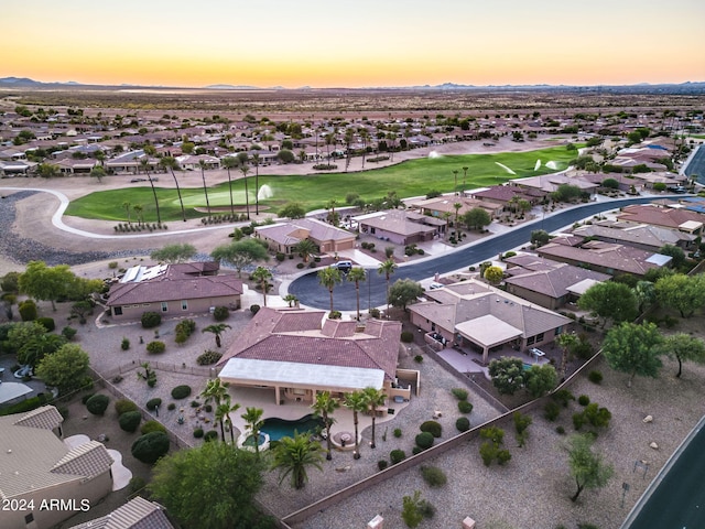 birds eye view of property with a residential view and golf course view