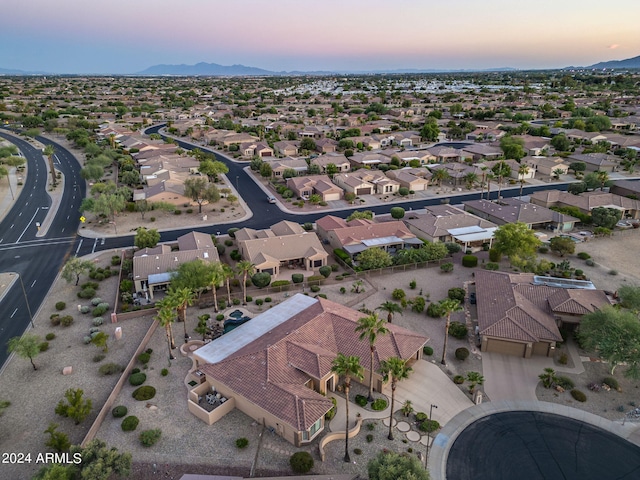 birds eye view of property featuring a residential view and a mountain view