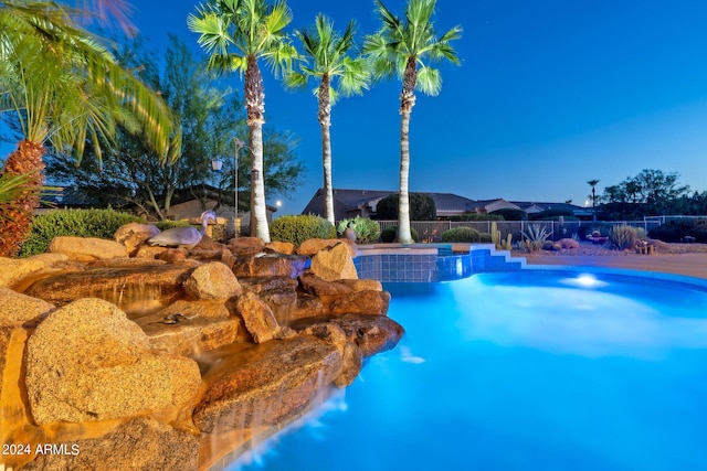 view of pool featuring fence and a fenced in pool