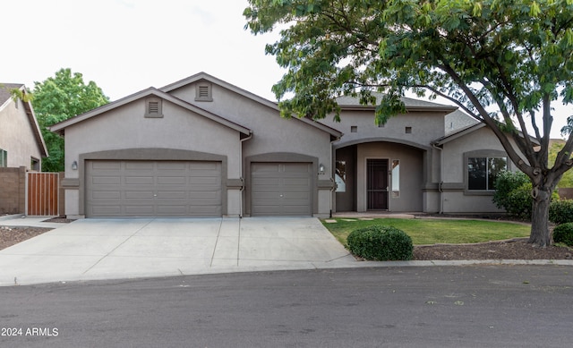 view of front of home with a garage