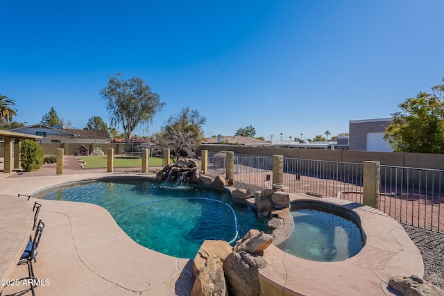 view of swimming pool featuring an in ground hot tub and pool water feature