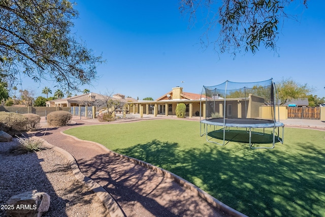 view of yard featuring a trampoline