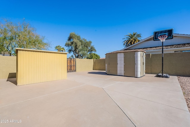 view of patio / terrace with a storage shed