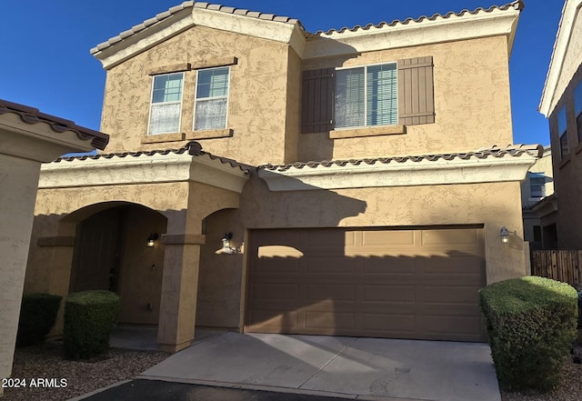 view of front of home with a garage