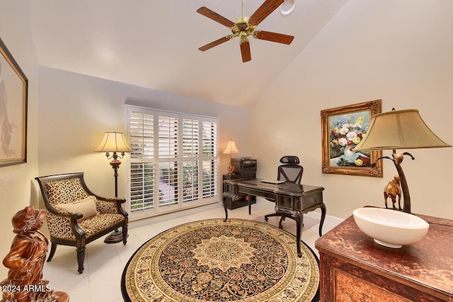 home office featuring ceiling fan, light tile patterned floors, and high vaulted ceiling