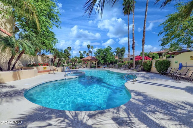 view of pool featuring a gazebo and a patio