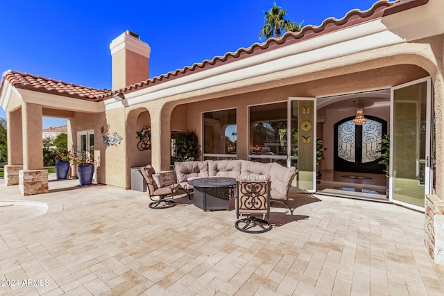 view of patio / terrace with french doors and an outdoor hangout area