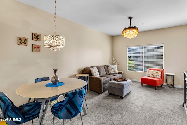 view of carpeted dining space