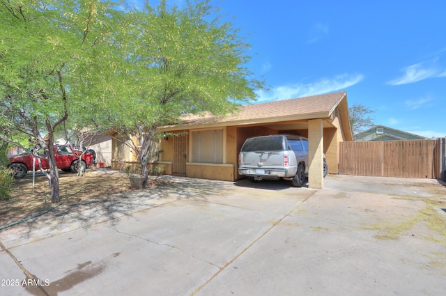 7038 W Fillmore St, Phoenix, AZ 85043 - ranch-style home featuring fence, stucco siding, and driveway