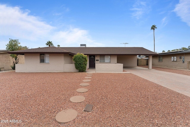 view of front of house with a carport