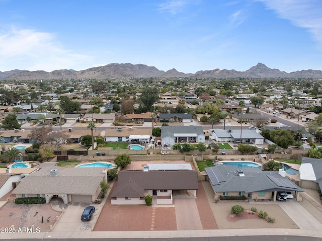 drone / aerial view featuring a mountain view