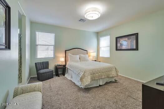 bedroom featuring carpet