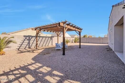 view of yard featuring a pergola and a patio