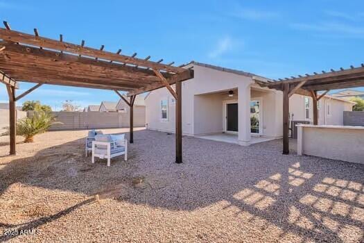 exterior space featuring a patio area and a pergola