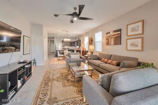 living room featuring ceiling fan