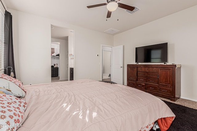 bedroom with ceiling fan and carpet