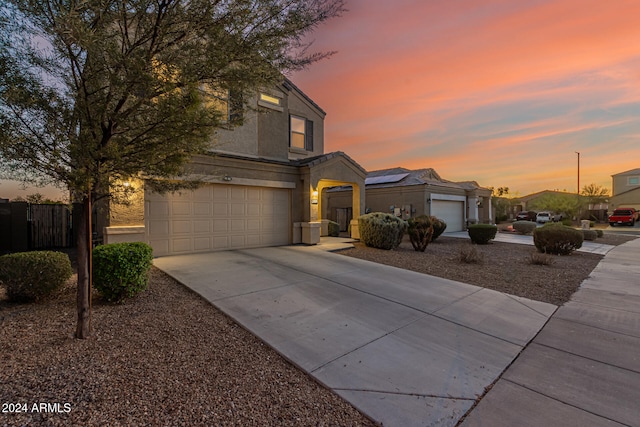 view of front of property featuring a garage