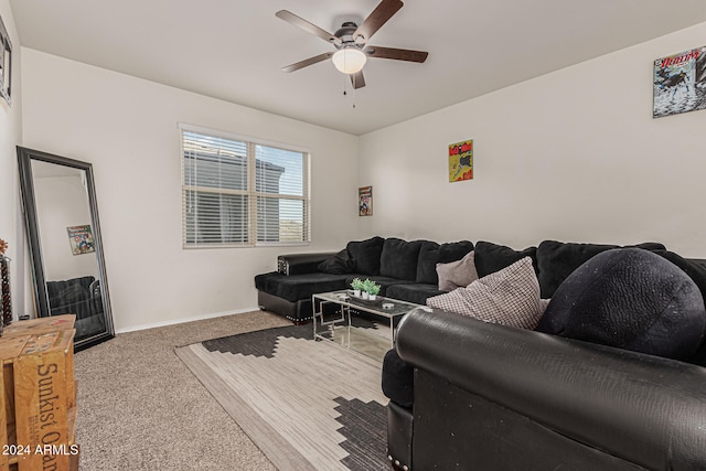 living room featuring carpet flooring and ceiling fan