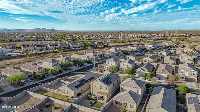 birds eye view of property with a mountain view