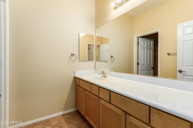 bathroom featuring vanity and tile patterned flooring