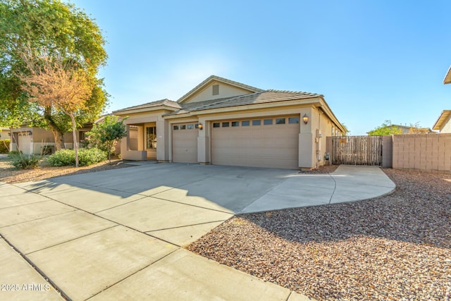 view of front of property with a garage