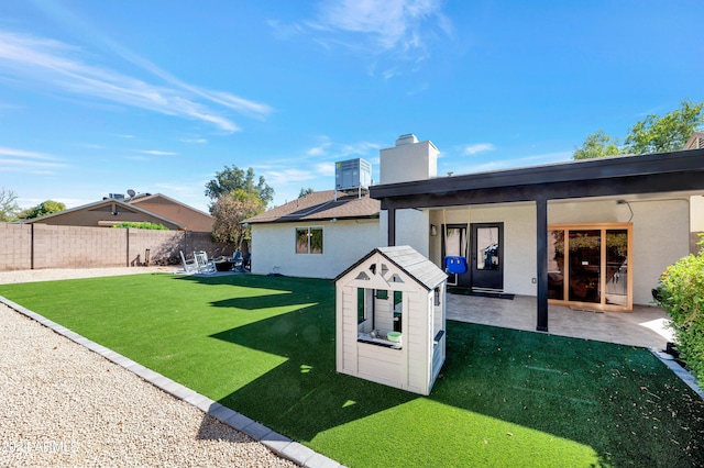 view of yard featuring a patio area and a fenced backyard